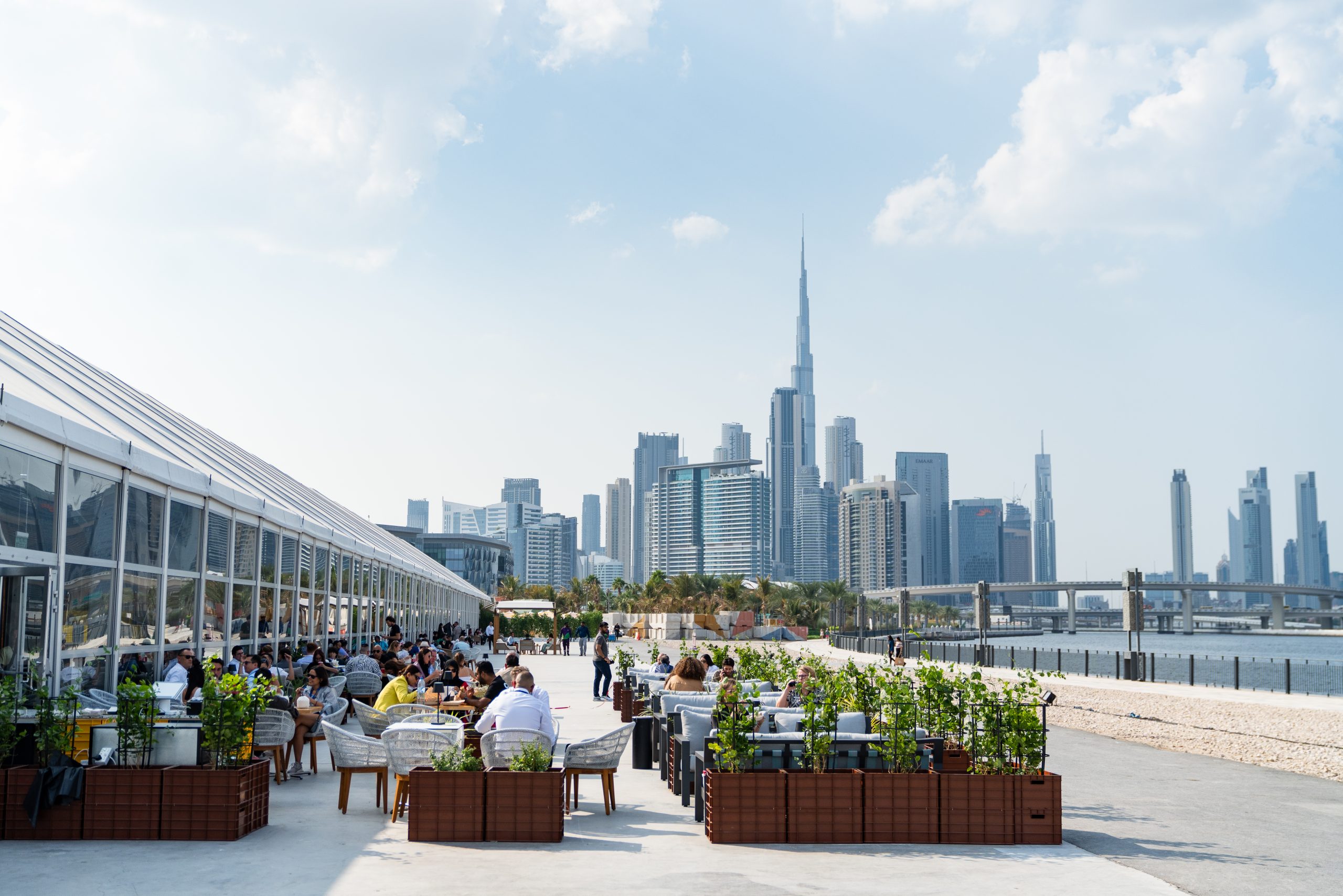 Dubai Design Week 2024 at d3 waterfront overlooking dubai skyline