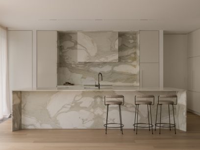 marble minimalist kitchen with an island and stools